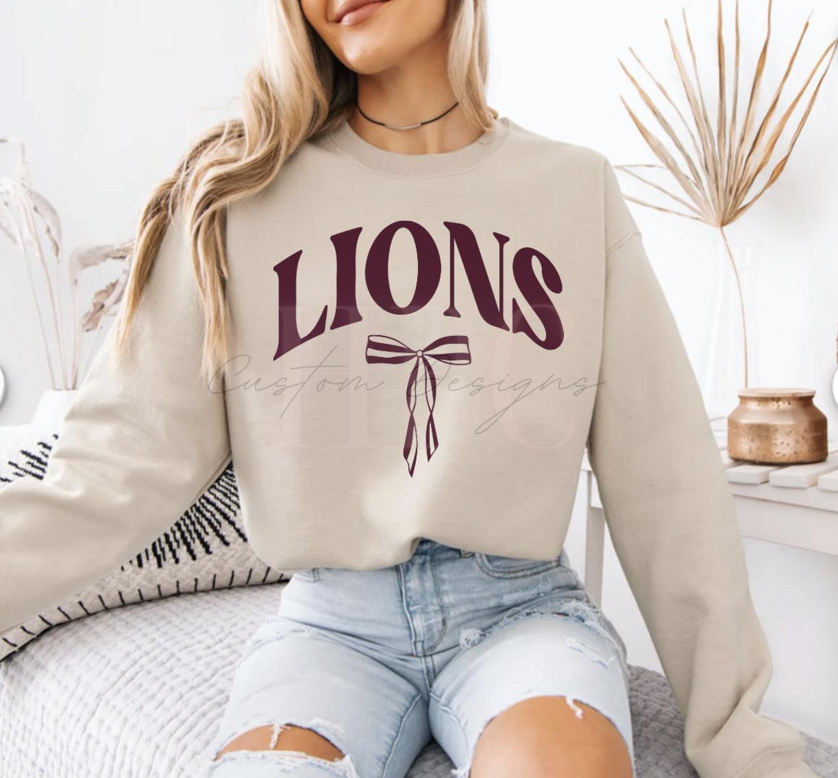 Maroon- Lions with bow- ivory sweatshirt